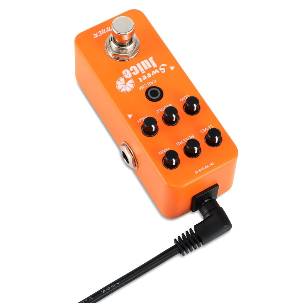 Black DC power cable plugged into a guitar pedal, molded connector end