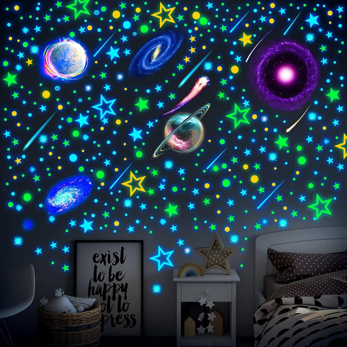 Glow-in-the-dark galaxy wall decals featuring planets, rings, and multi-color stars