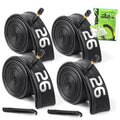 Black bicycle inner tubes set with valves, tightly coiled in four-pack bundle.