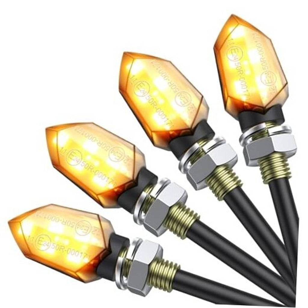 Set of four amber LED motorcycle indicators with black hex lenses and threaded mounts