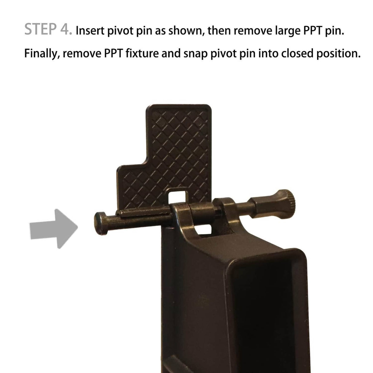 Pivot pin install tool inserting a pivot pin; black base with brass-toned handle rod.