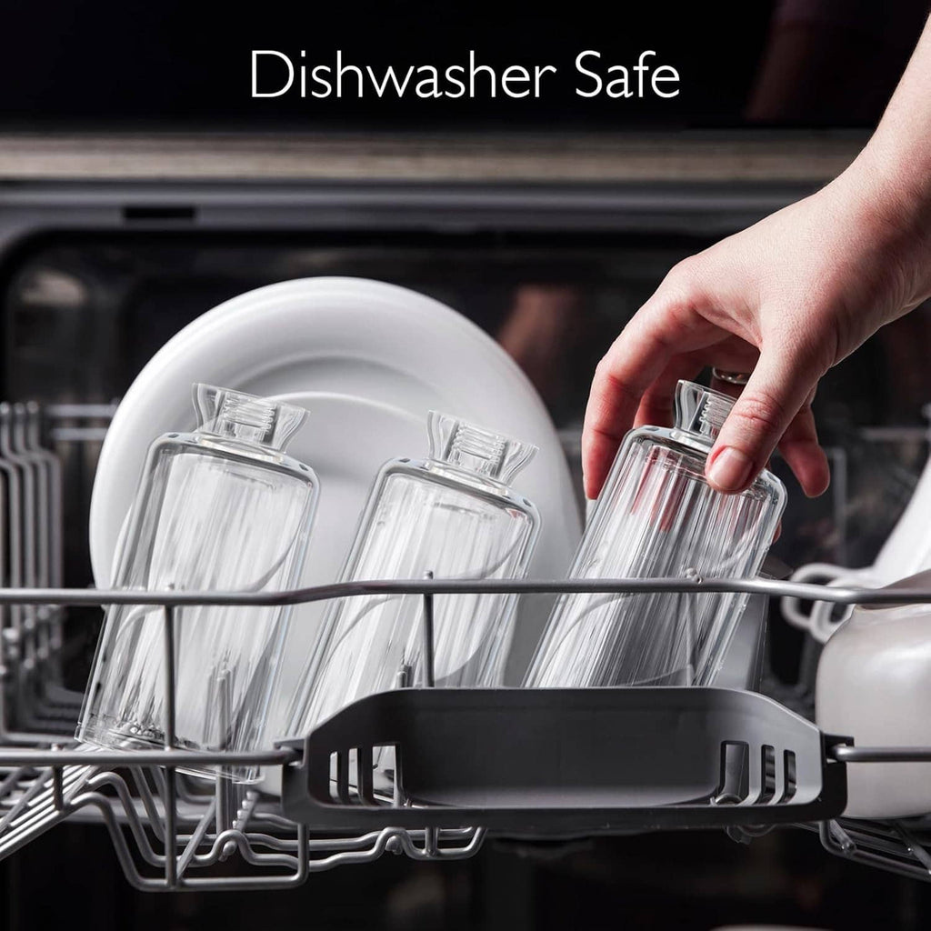 Clear squeeze molds and cups loaded in dishwasher rack
