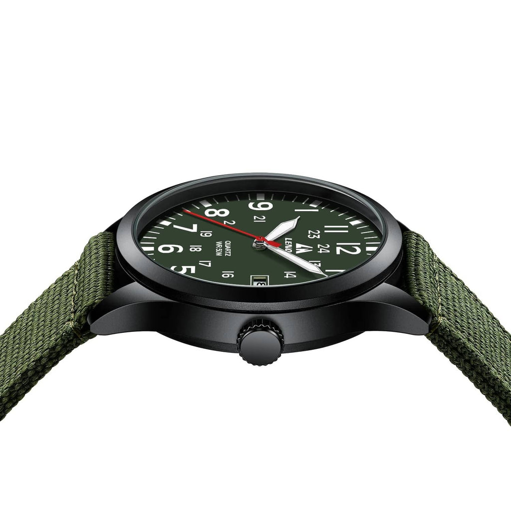 Men's military sport analog watch close-up with green dial, black bezel, green fabric strap