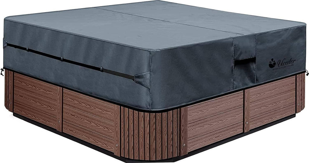 Waterproof hot tub cover, dark gray rectangular cover with side straps and corner opening.