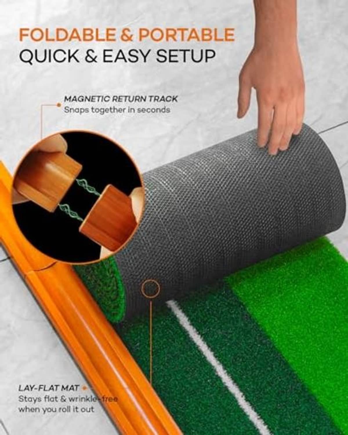 Portable golf putting mat with rolled track and orange return track, lay-flat base