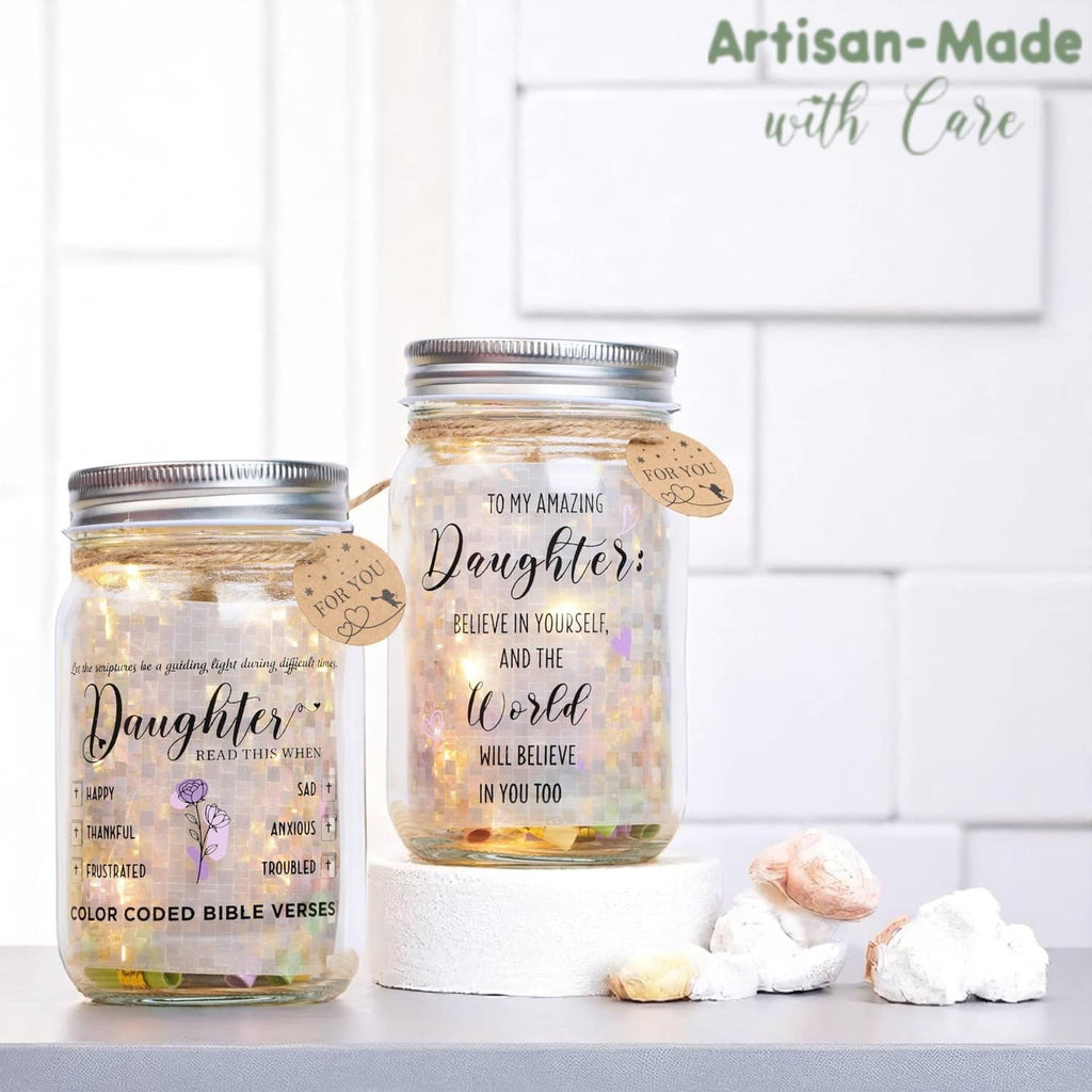 Two clear glass LED mason jars on a ledge with warm glow and “Daughter” verse text