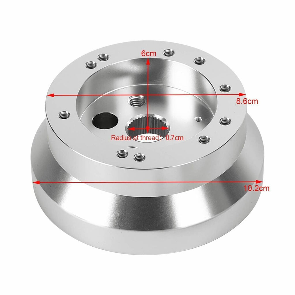 Polished steering wheel hub adapter with 5/6-bolt pattern and center spline opening
