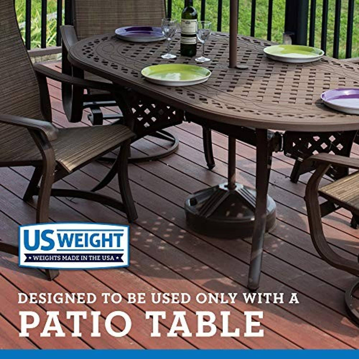 Brown fillable umbrella base on a patio deck near a furniture table