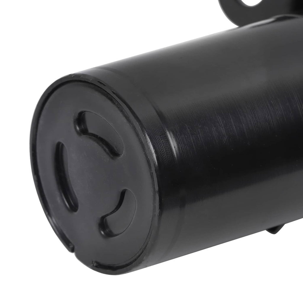 Front shock absorber strut black cylindrical body end cap with rounded rubber bushing.