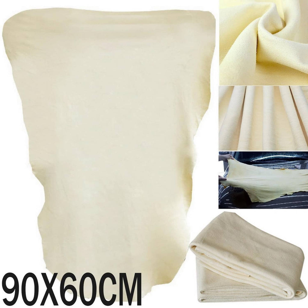Off-white chamois leather cleaning cloth, soft folds and neatly stacked corner view