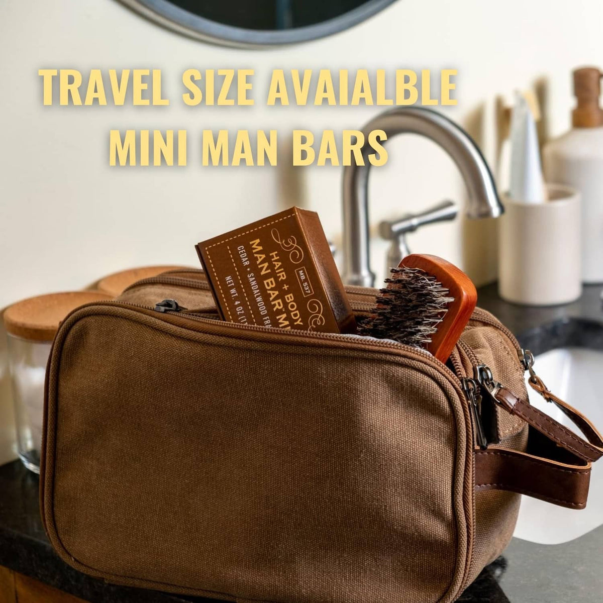 Brown travel toiletry pouch with mini Man Bar soap boxes and brush