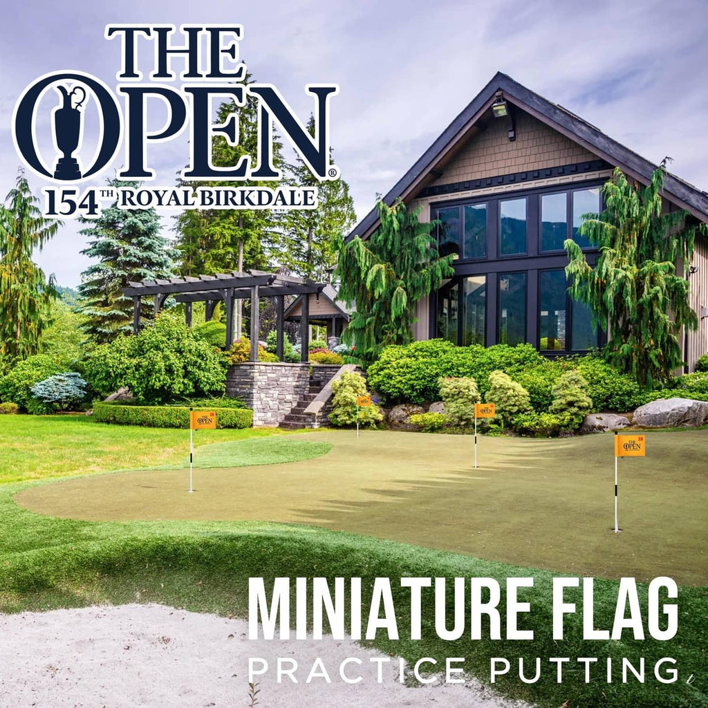 Miniature golf flag with 'The Open' 18 logo on orange-yellow fabric