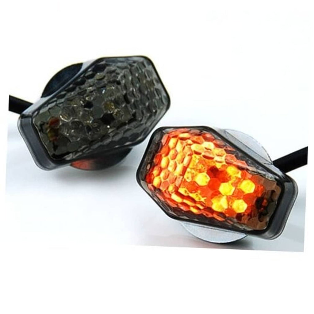 Amber LED turn signal indicators with smoke lenses and black wires, pair