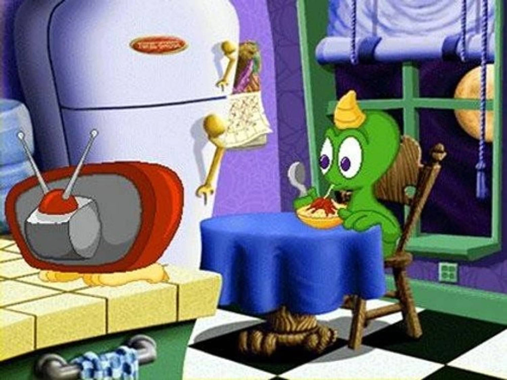 Cartoon math game scene with green character seated at a round table
