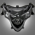 Motorcycle headlight assembly with clear lens and chrome reflectors, black housing