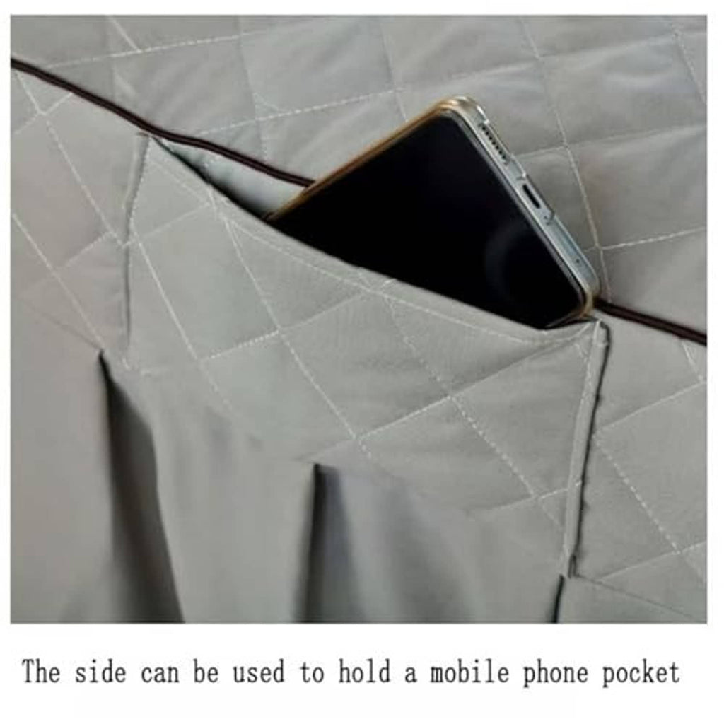 Grey quilted massage table skirt with side phone pocket opening