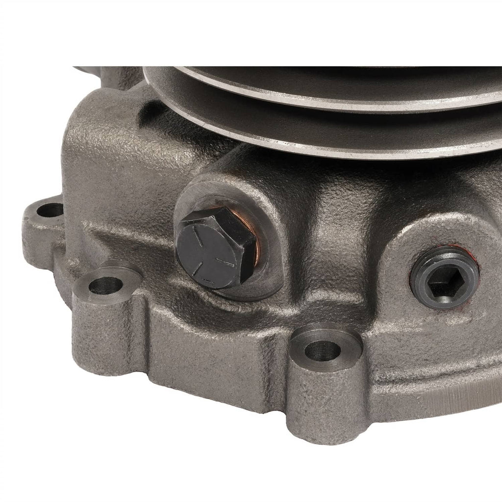 Water pump end view showing hex head bolt recess and threaded mounting hole