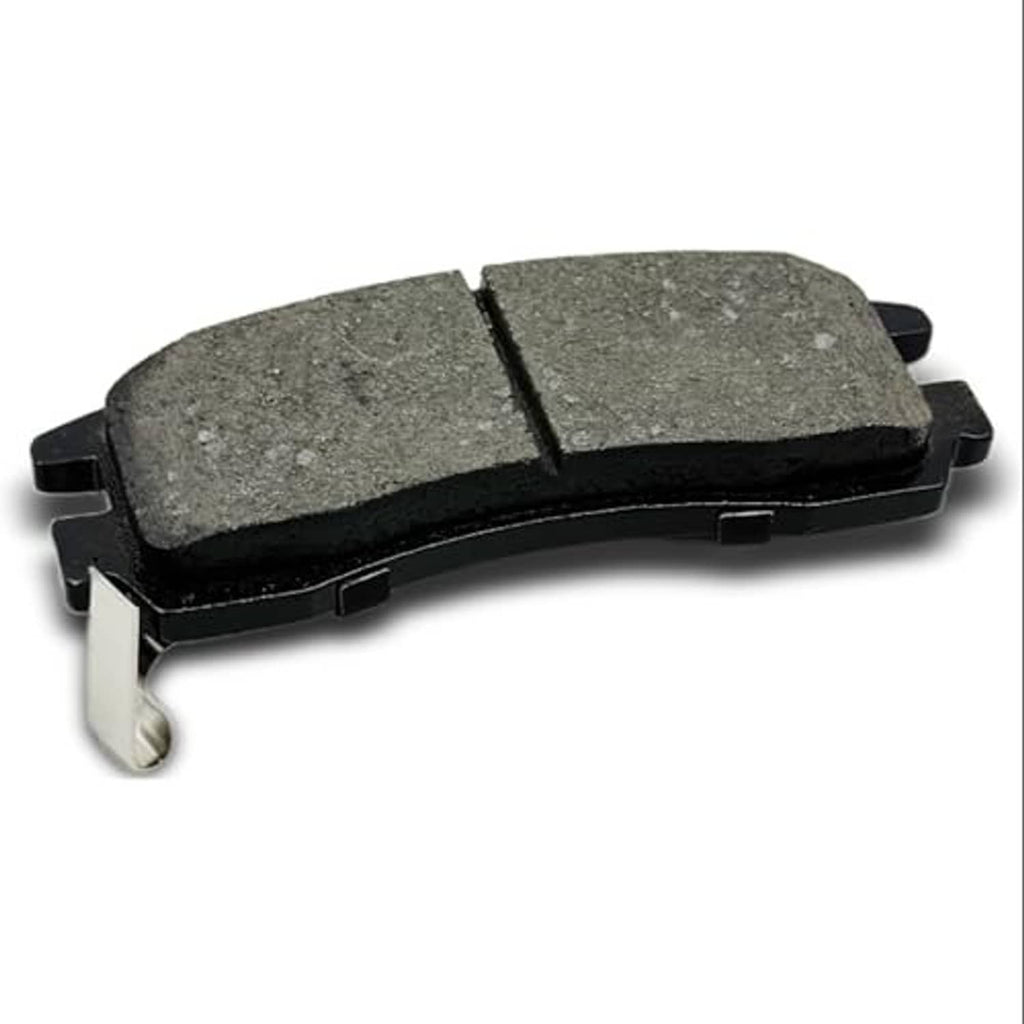 Single gray ceramic brake pad with metal backing and support clips, side view