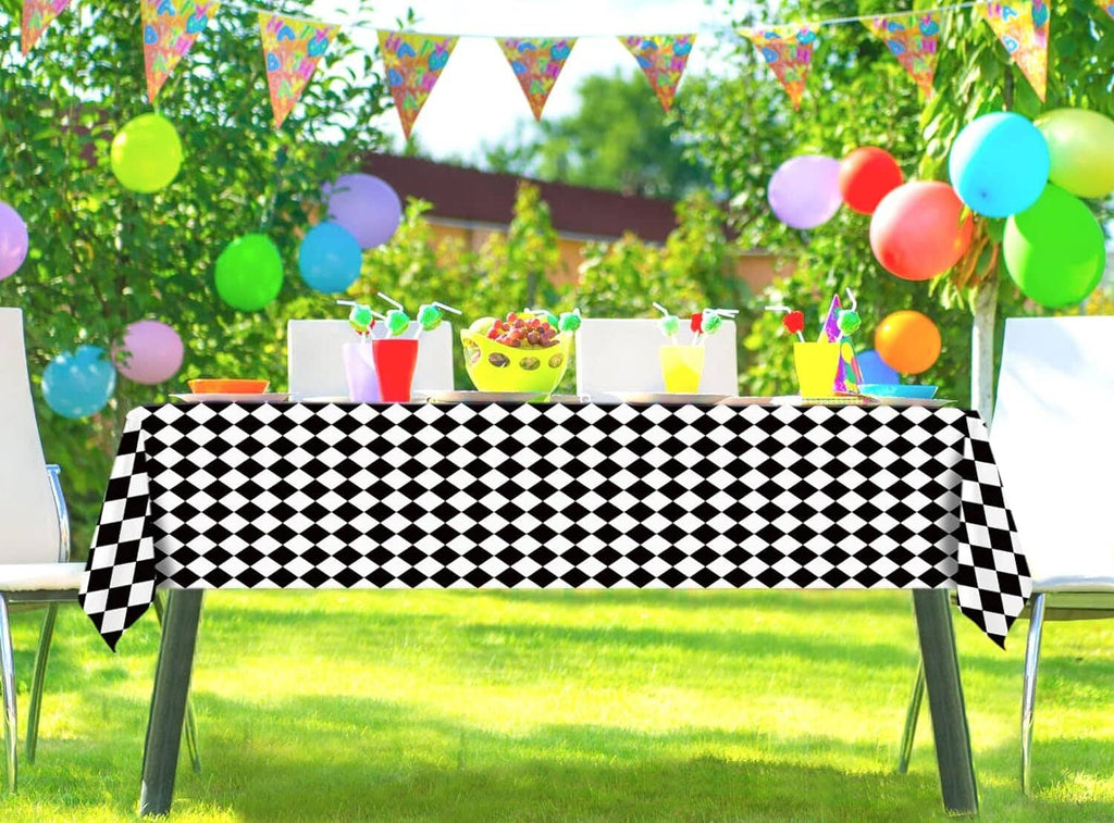 Black and white diamond check party tablecloth on a table
