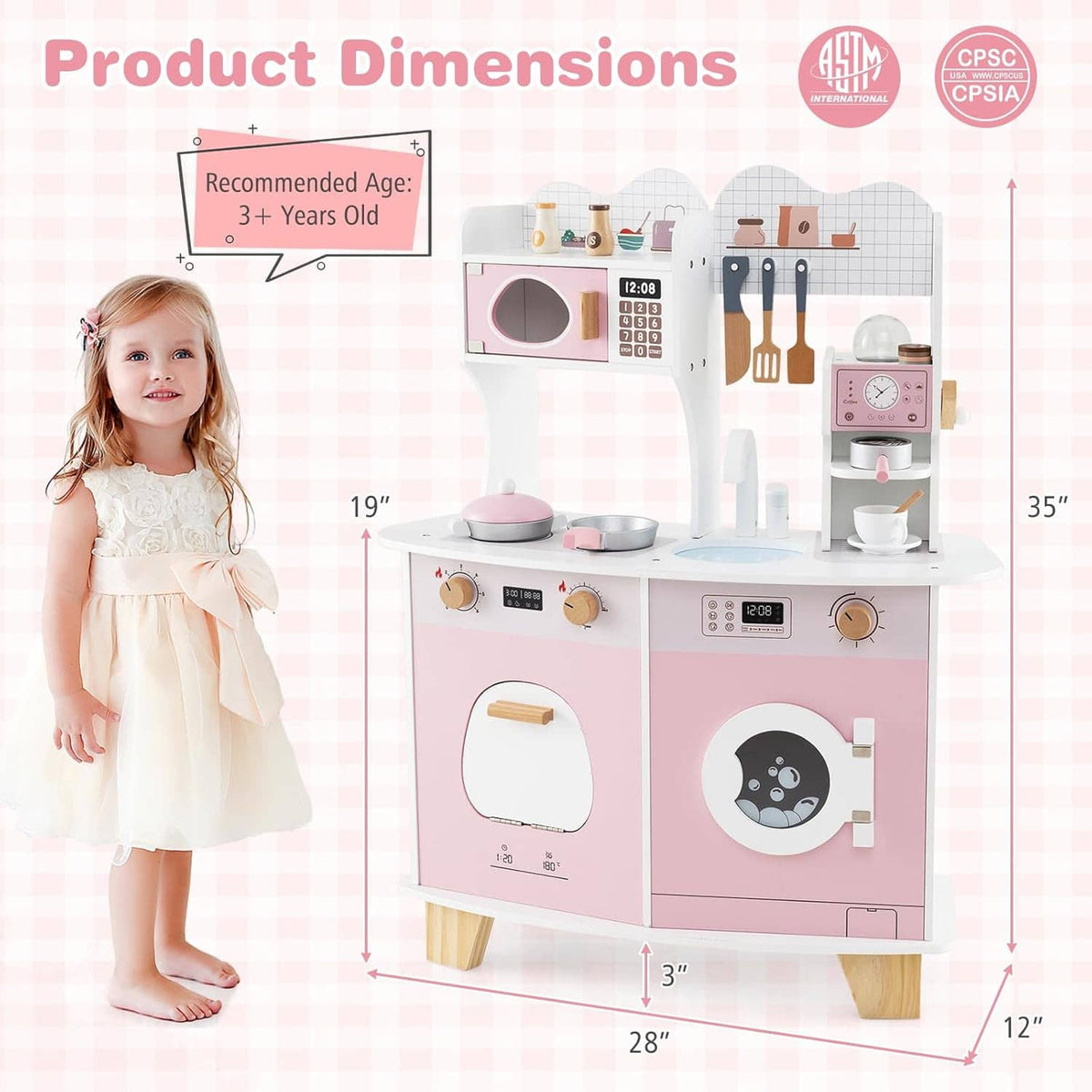 Pink and white wooden play kitchen set with coffee maker, sink, and stove, shown with child