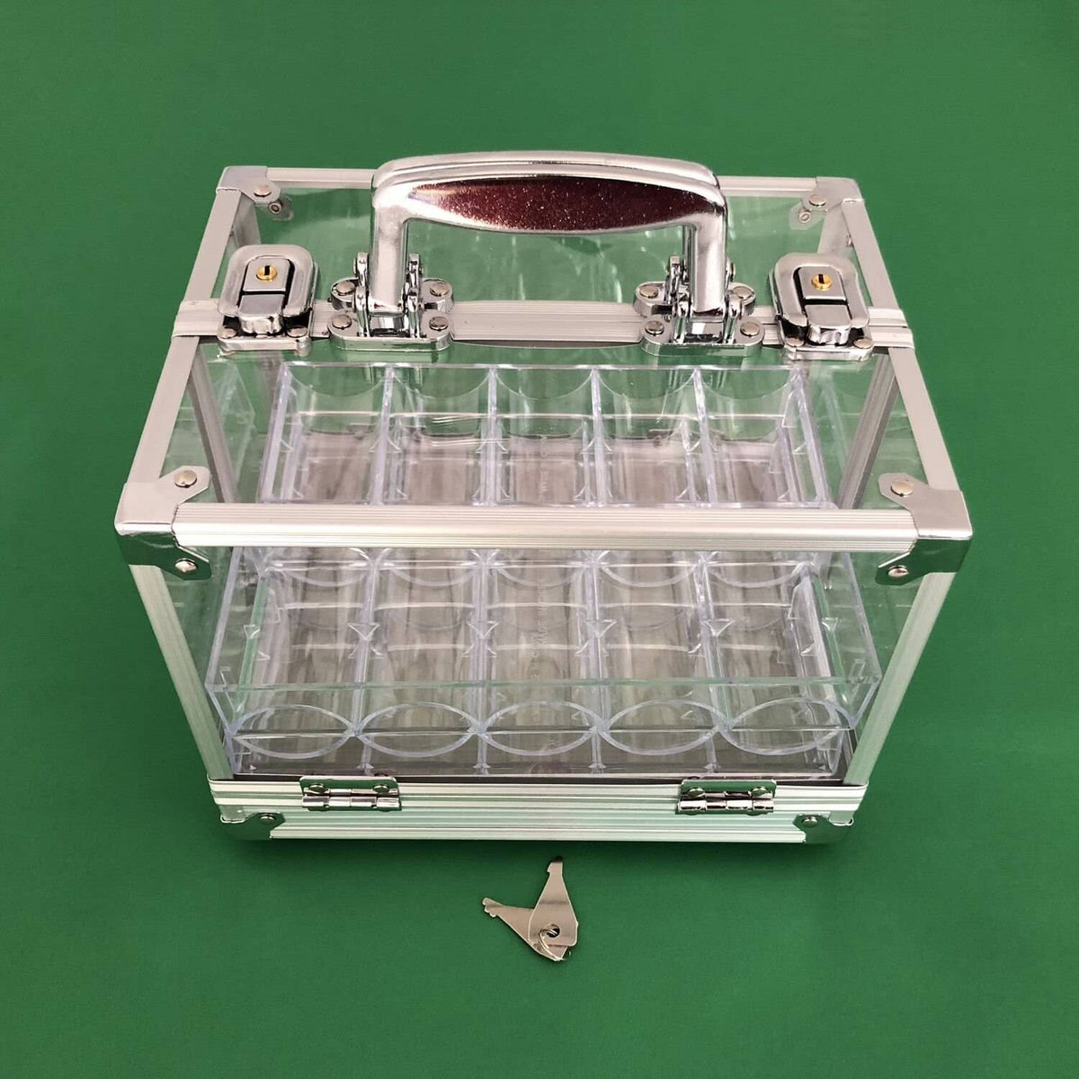 Clear acrylic poker chip carrier with open lid and internal chip compartments