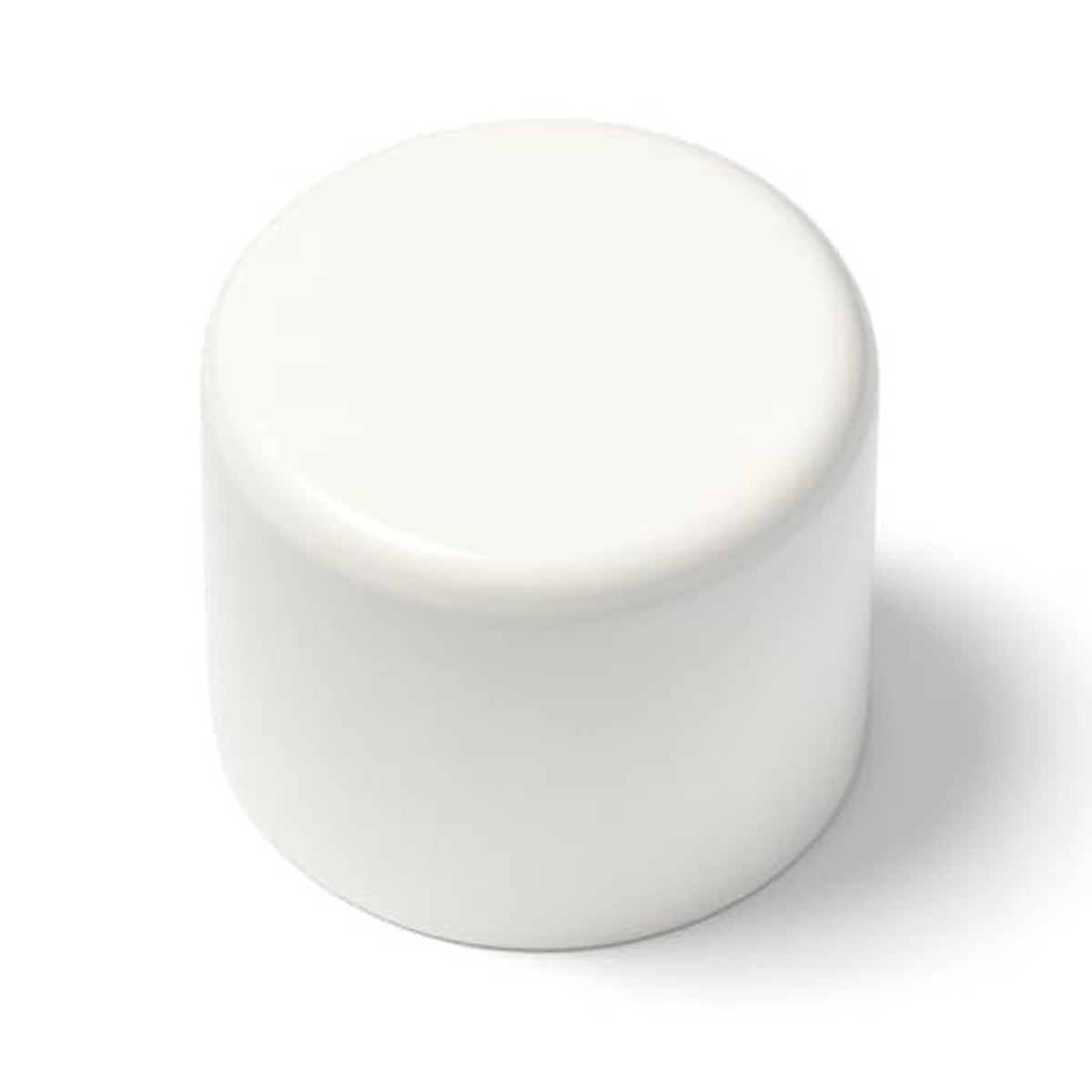 White plastic pipe end cap with round top and cylindrical body