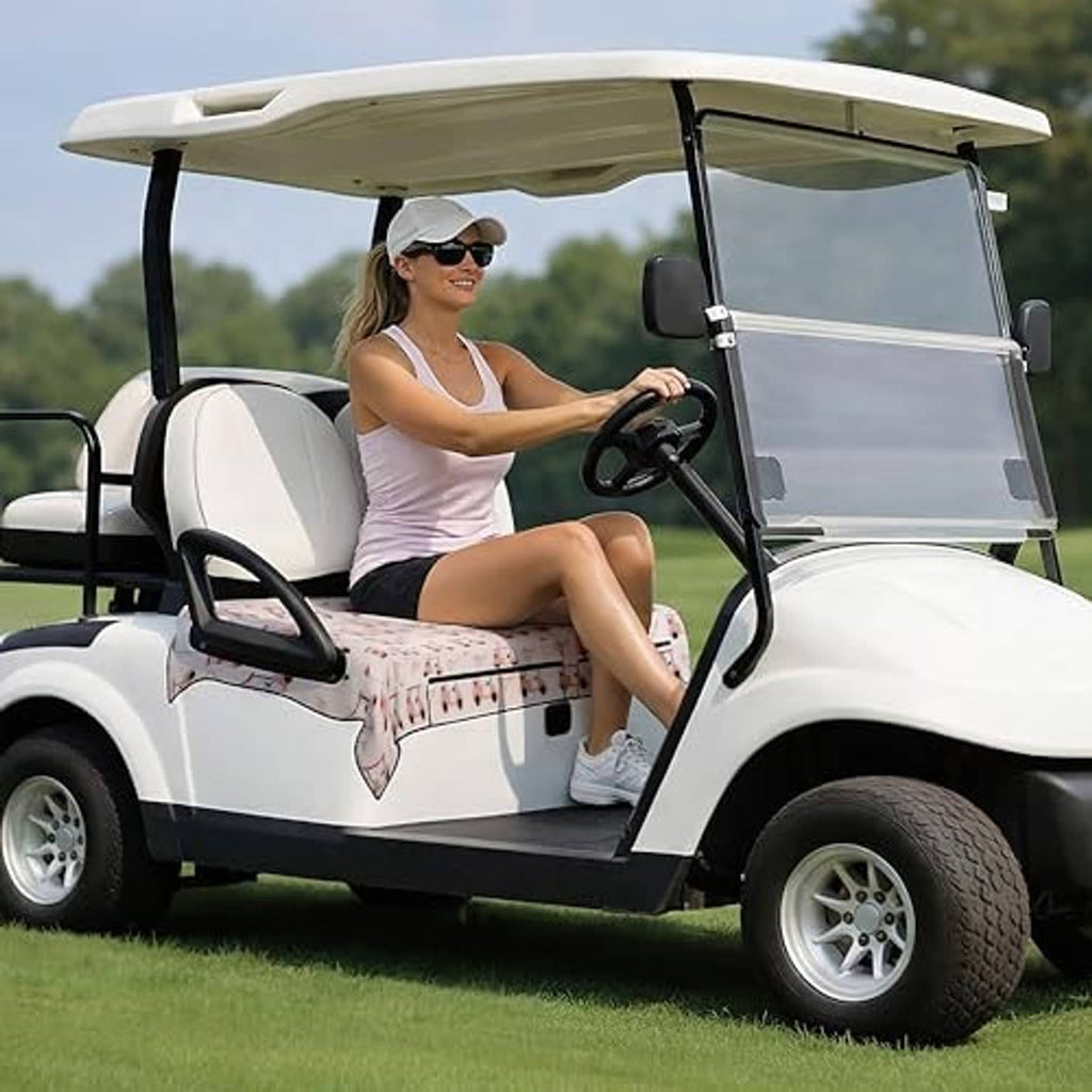 Pink patterned golf cart seat cover on front bench with cart icon print