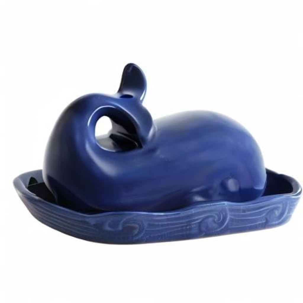Dark blue whale-shaped butter dish lid with circular opening, front view