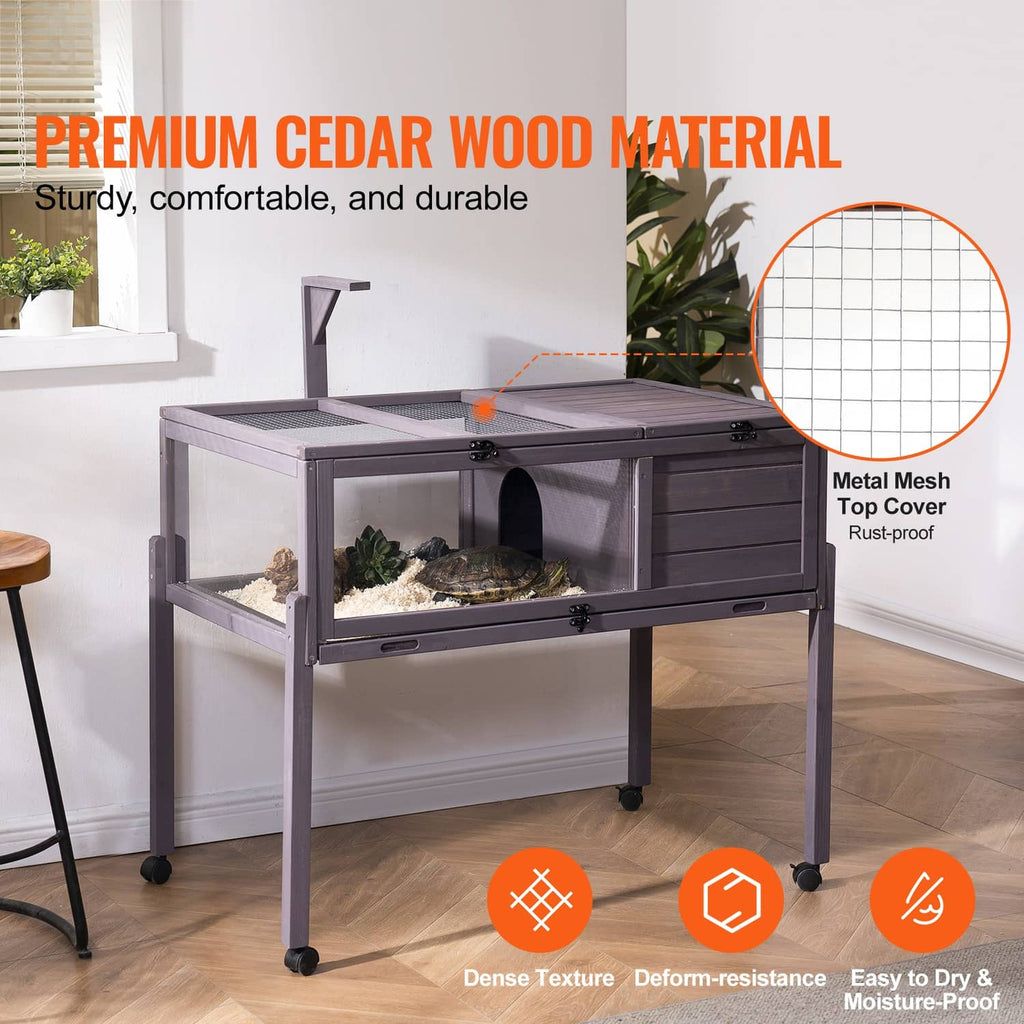 Gray wooden tortoise habitat with metal mesh cover, front access door, and casters