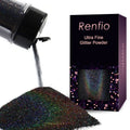 Holographic ultra fine glitter powder, black shade, poured from a bottle onto a pile