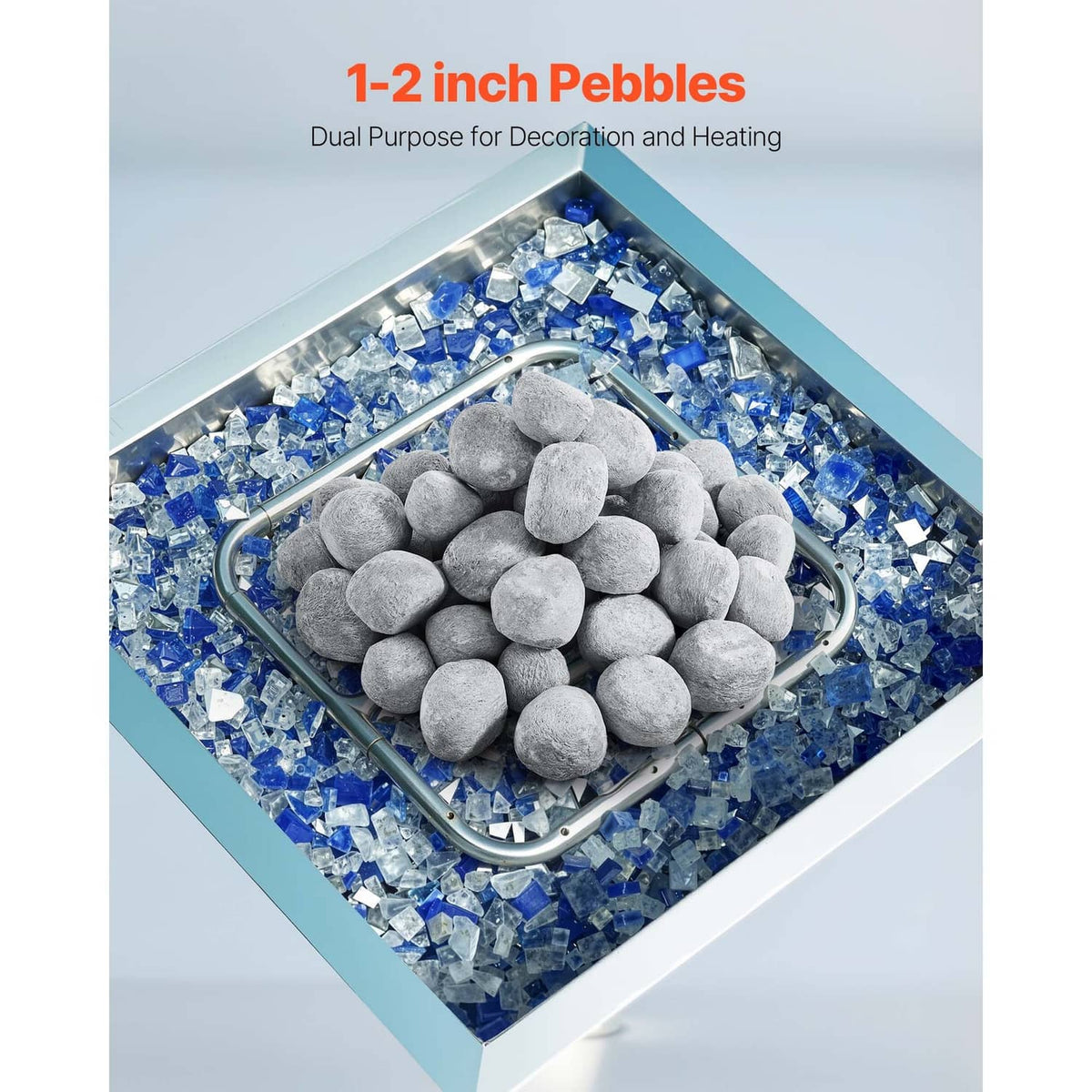 Grey ceramic fire pebble stones piled in a fire pit insert with blue glass chips.
