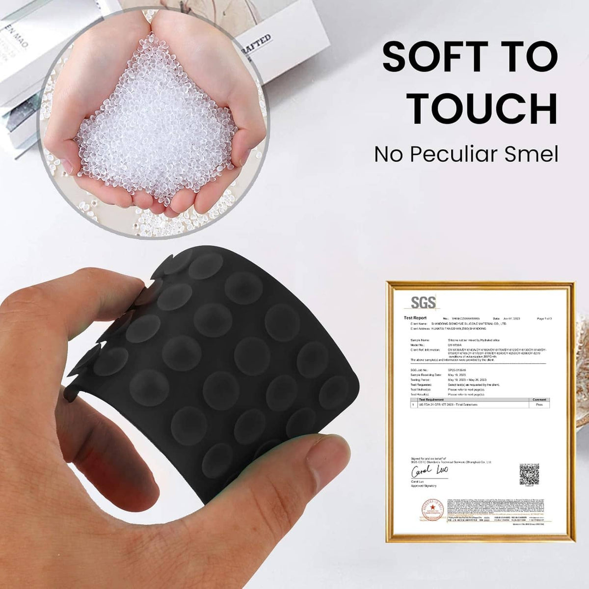Black silicone suction-grip pad held by hand, with round cup texture