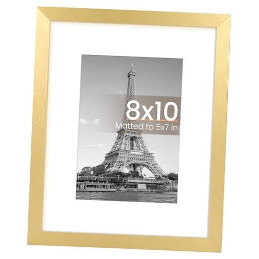 Gold picture frame with white mat, holding an 8x10 photo of the Eiffel Tower