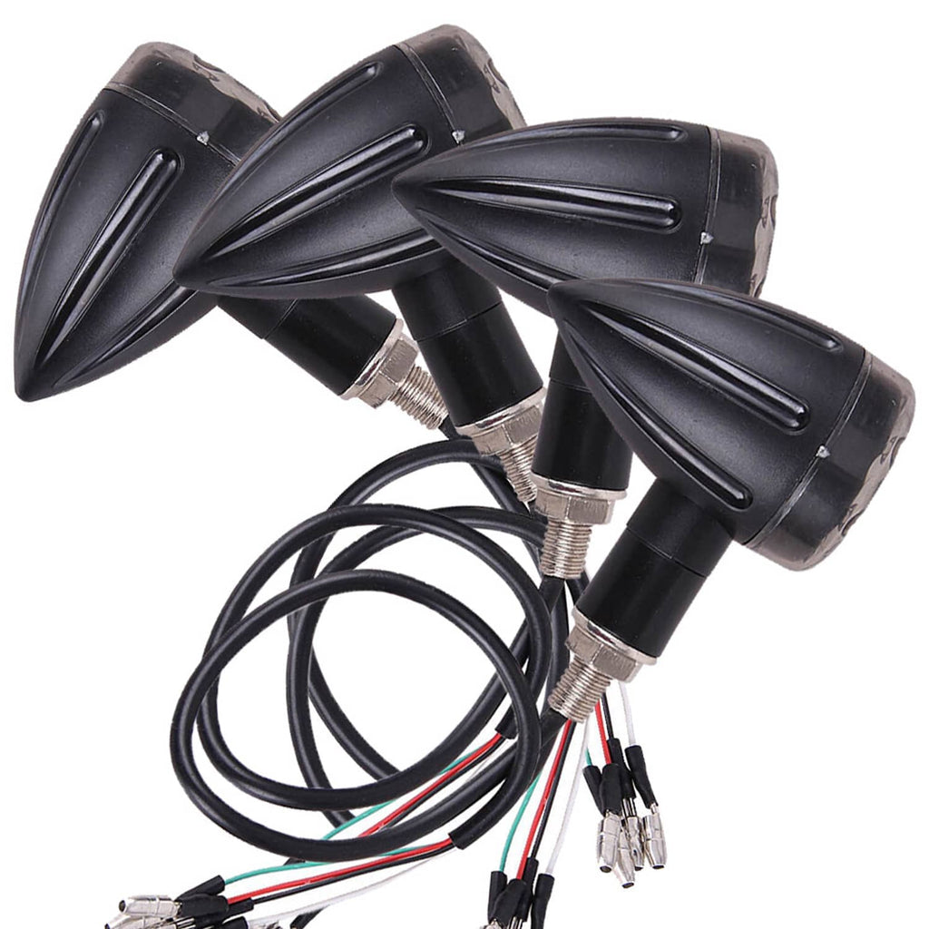 Four black motorcycle LED turn signal blinkers with rubber housings and wiring
