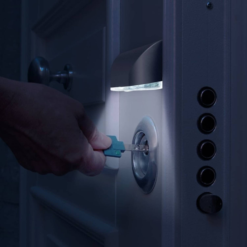 Auto PIR LED keyhole light mounted near door keyhole, glowing white
