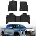 Black molded TPE floor mats set with raised channels and anchor grips