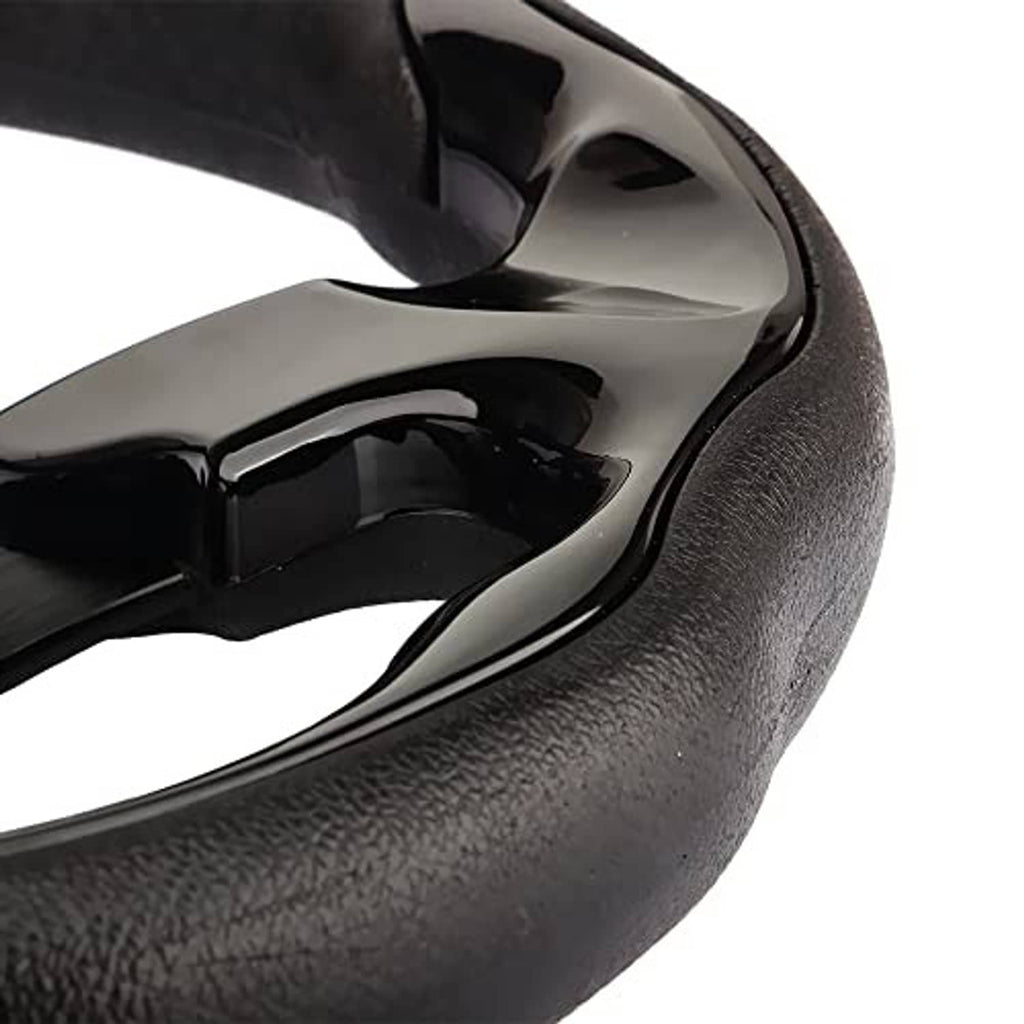 Black steering wheel grip rim with fine textured surface and glossy spoke accents