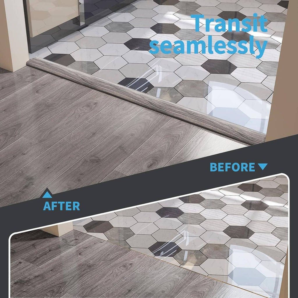 Gray woodgrain floor transition strip laid between floors along the doorway