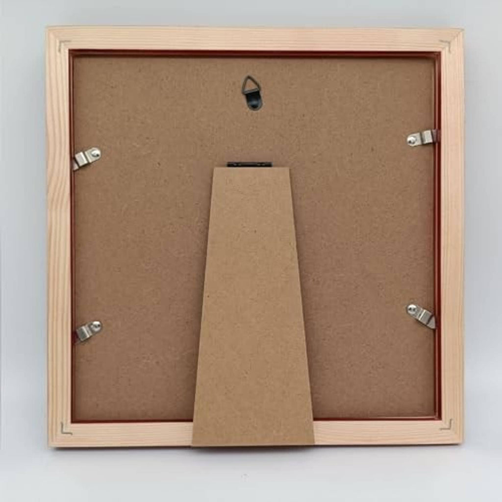 Back view of light wood picture frame with mounting clips and fold stand
