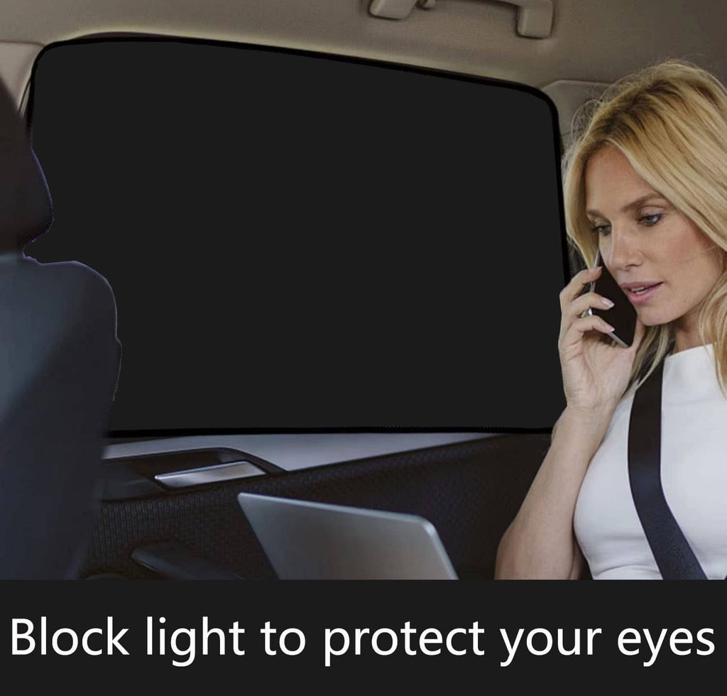 Car window sun shade panel behind driver seat, helping block bright light