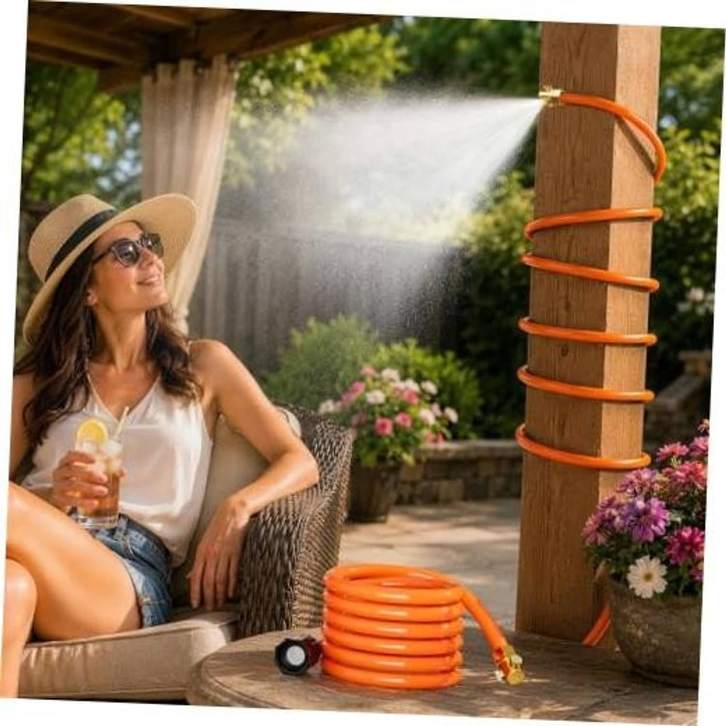 Outdoor patio hose mister with orange coiled line spraying mist from a brass connector