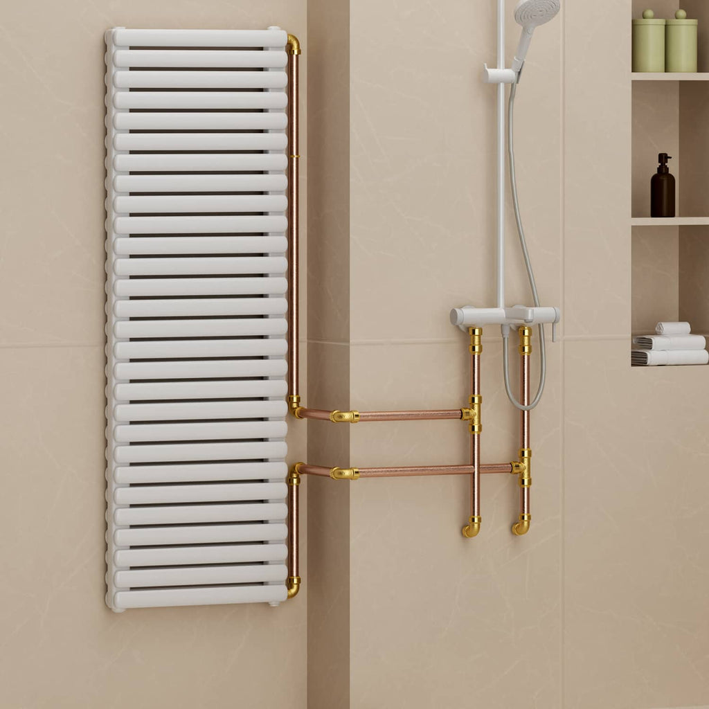 Gold brass radiator plumbing push-fit connectors on tube lines