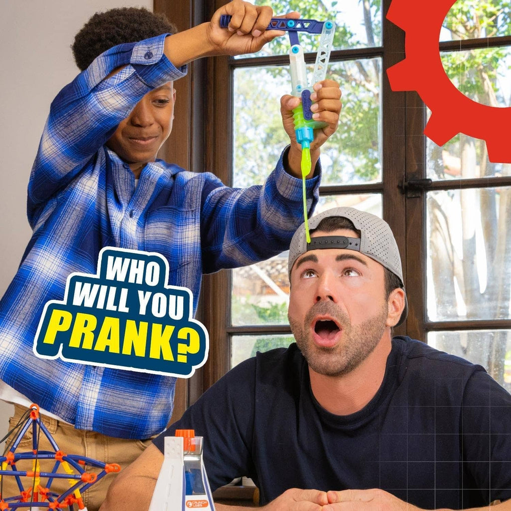 Multicolor snot pump launcher toy with blue frame and green base, slime prank lab kit