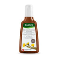 RAUSCH anti-dandruff shampoo bottle, brown with green label, white cap