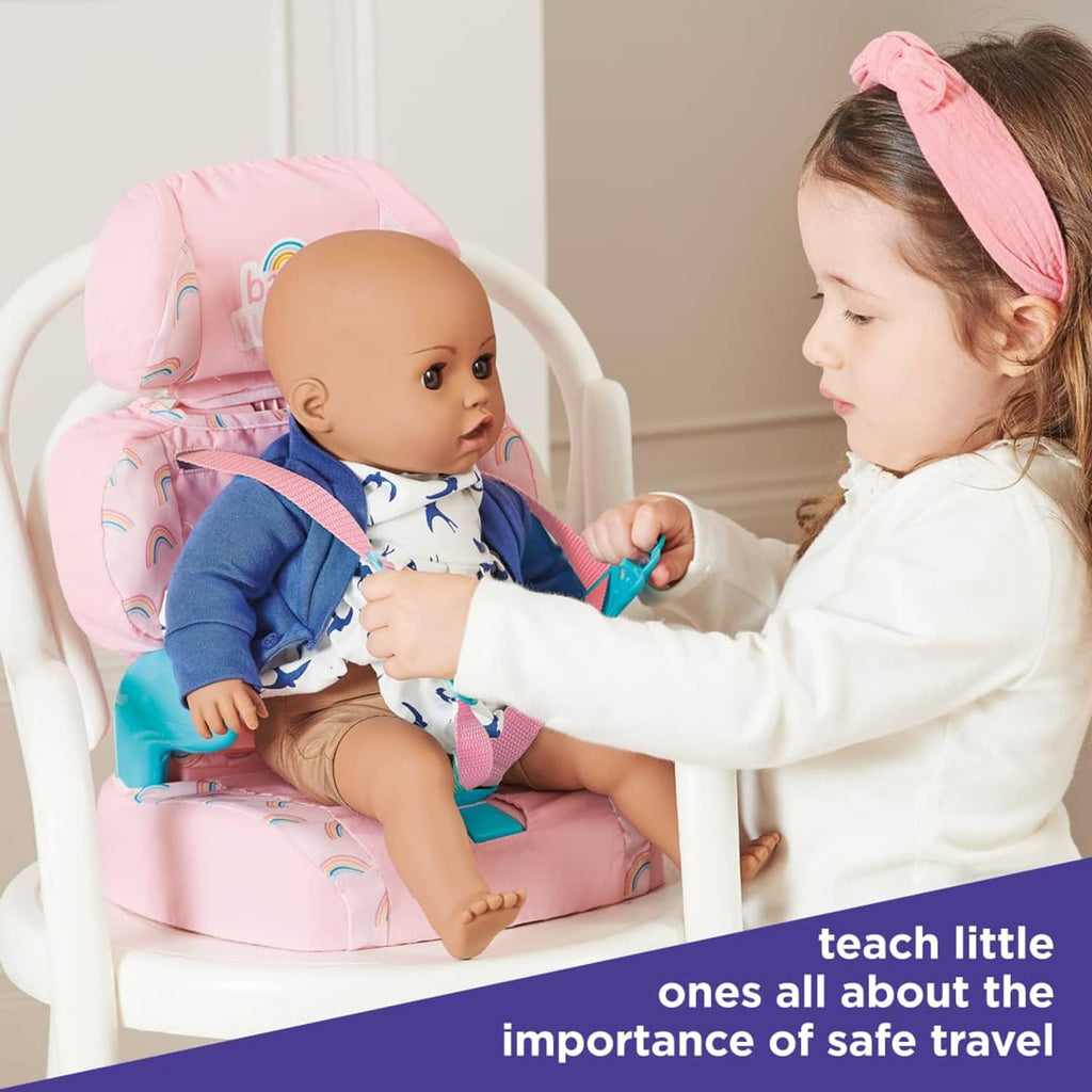 Pink doll booster seat with baby doll and adjustable straps, blue side supports
