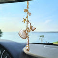 Rearview hanging charm with gold chain, starfish, shell pendants, and crystal beads