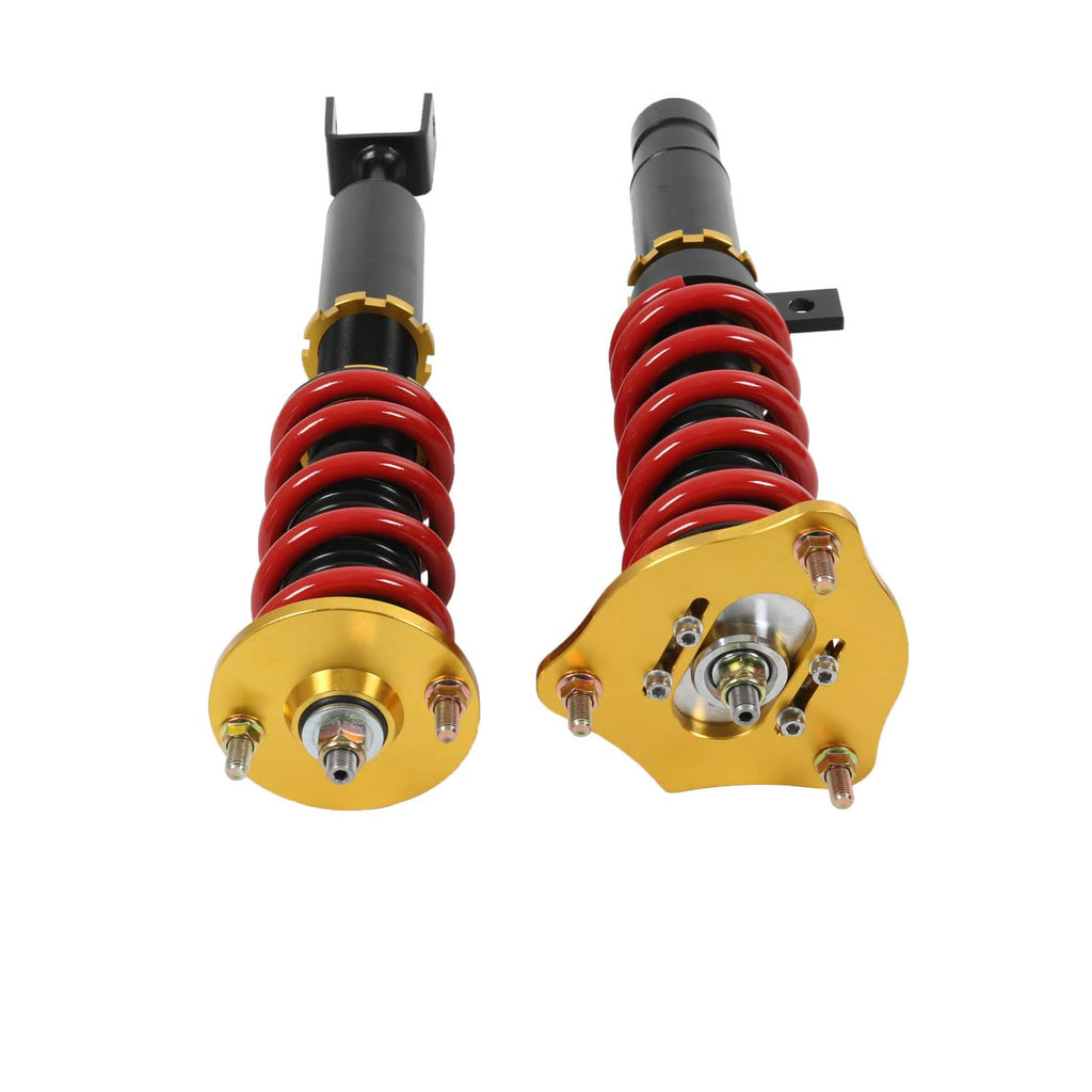 Coilover suspension strut with red coil springs, gold top mounts, and black shock body