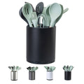 Black rotating kitchen utensil holder with mint silicone tools inside