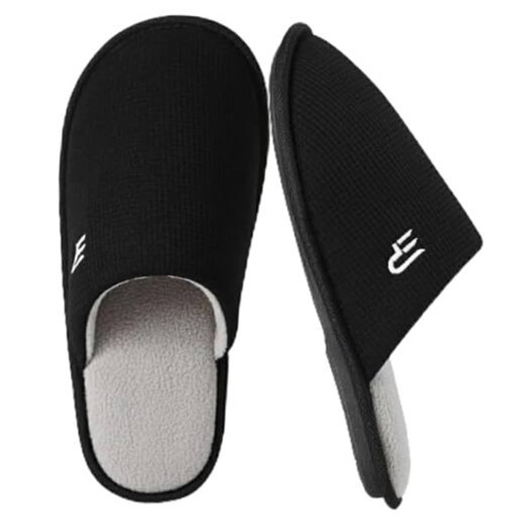 Black knit slip-on slippers with plush light lining and logo on side