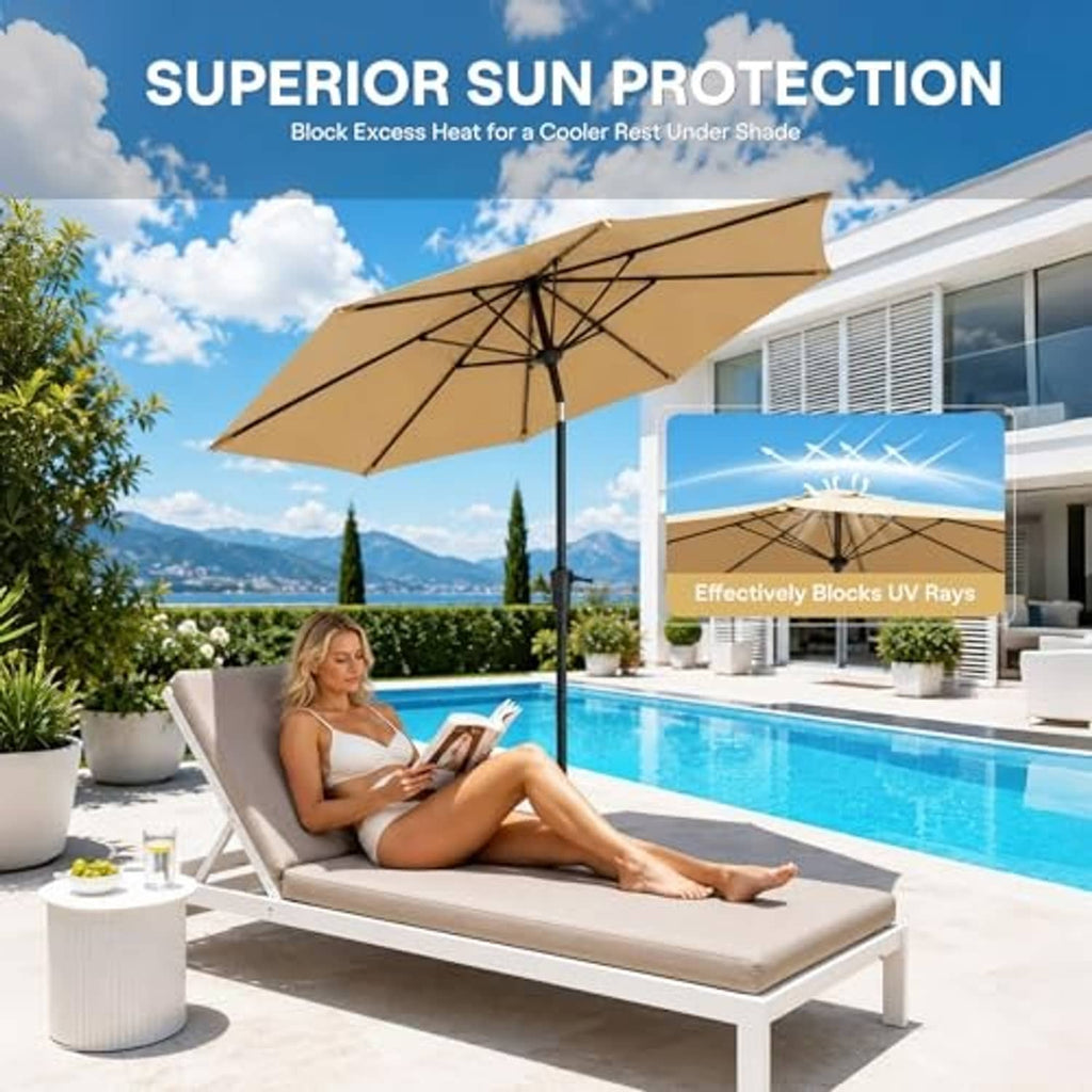 Beige patio umbrella over poolside lounge seating